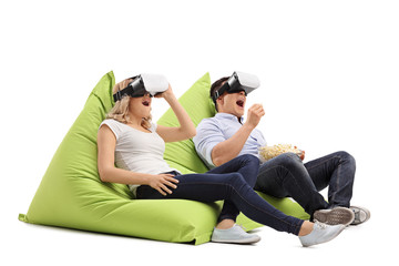 Excited couple experiencing virtual reality