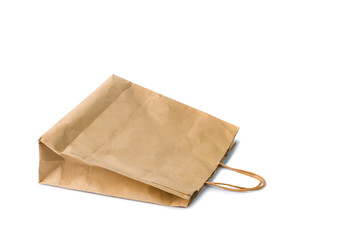 Blank brown paper bag isolated on white background