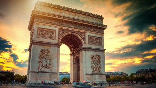 Beautiful sunset over Arc de Triomphe. Paris, France. Timelapse