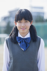 佇む女子学生