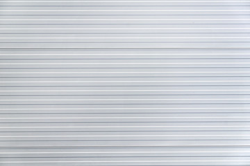Sheet metal, corrugated wall building
