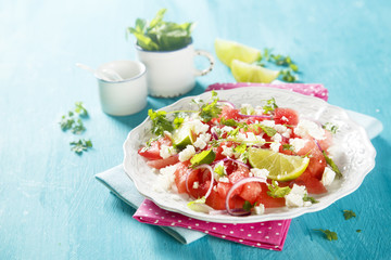 Watermelon salad with feta cheese and onion