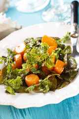 Glazed carrots with pea pods