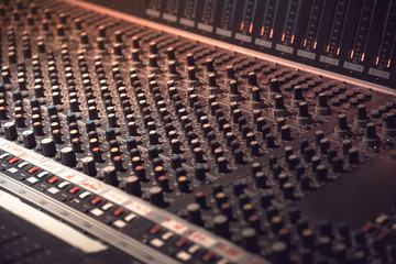 Sound recording equipment. Music mixer controls. Soft photo