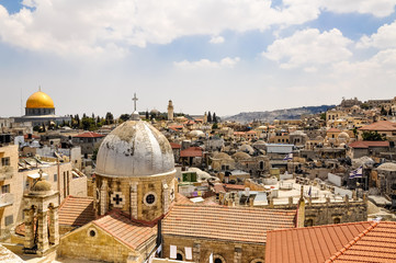 Fototapeta na wymiar View of Old City of Jerusalem against cloudy sky