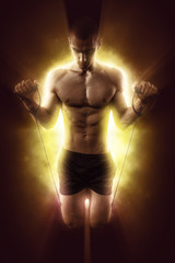 Sexy Athletic Man posing on glowing background