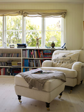 Traditional living room with armchair and footstool