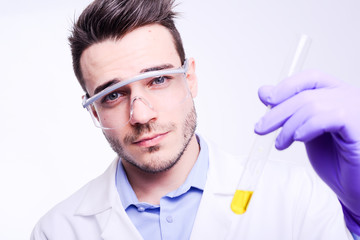 handsome young chemical biologist working in a laboratory