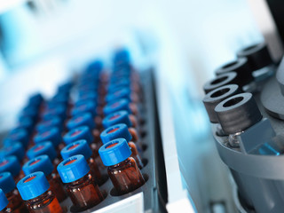 Gas chromatography separating vials of complex compound mixtures into individual components