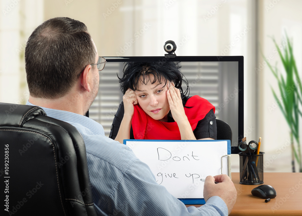 Wall mural telepsychiatry for depressed woman