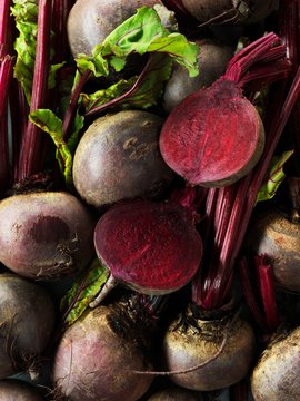Raw beetroot, whole and sliced in half
