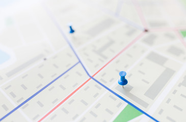 Naklejka na ściany i meble close up of map or city plan with pin