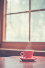 Red mug coffee and window