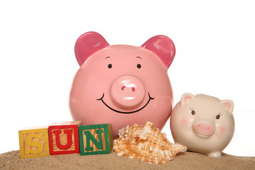 Saving money on your summer holiday piggy banks