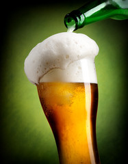 Pouring beer on green