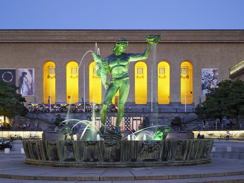 Illuminated fountain at night