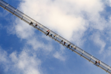 The pedestrian suspension bridge called Highline 179 in Reutte, Austria. Bring together the...