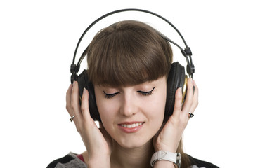 Fototapeta Kobieta marzy słuchając muzyki obraz