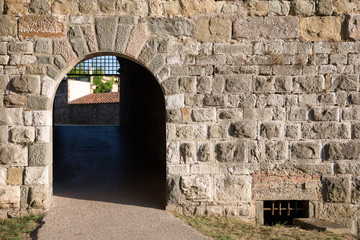 Arched Doorway in a Medieval Stone Wall