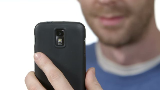 Man takes photo using cellphone
