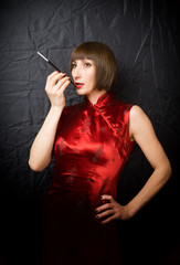 Obraz premium woman with a cigarette holder