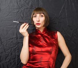 Obraz premium woman with a cigarette holder