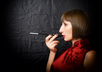 woman with a cigarette holder