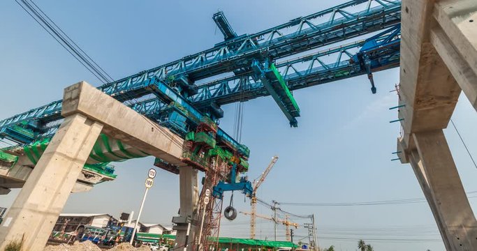 Timelapse at express way construction site while bridge girder erection machine working