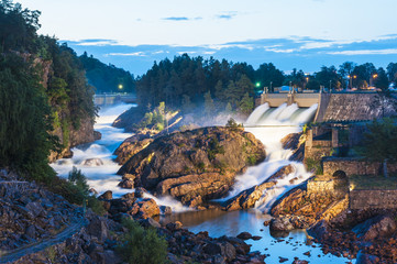 Dam on river at dusk