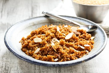 Lapsi /Broken wheat sweet pudding, selective focus