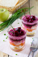 Salad with beets, apple, radish, carrots, potatoes, chicken egg,