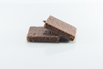 Snacks coated chocolate wafers.