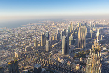 Naklejka na ściany i meble Aerial view of downtown in Dubai with blue sky