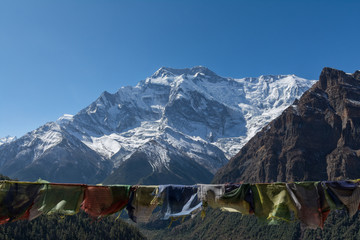 Annapurna II (two) peak and Nepalese flags