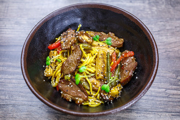 Duck sauce garnish pad thai egg noodles.Beef Szechuan garnish egg noodles
