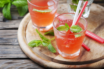 Fresh alcohol cocktail with rum, berry and mint