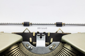 Hello word in capital letters on white sheet