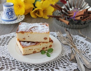 Cheesecake, cottage cheese pudding with fresh lemon.