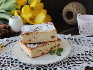Cheesecake, cottage cheese pudding with fresh lemon.