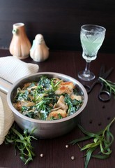 chicken in a creamy sauce with spinach and tarragon
