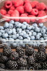 Fresh summer berries , wooden background, healthy food.