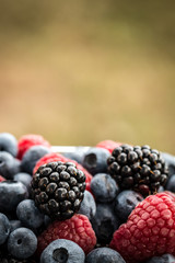 Fresh summer berries , wooden background, healthy food.