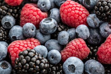 Fresh summer berries , wooden background, healthy food.