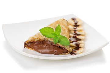 Crepes with chocolate cream and banana