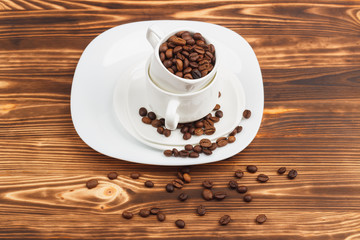 White dishware with coffee beans