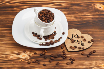 White dishware with coffee beans