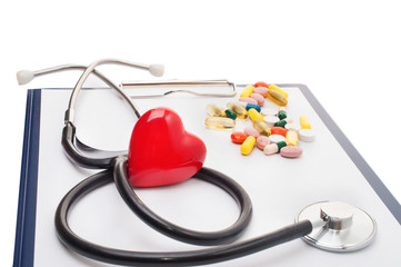Cardiogram with stethoscope and red heart