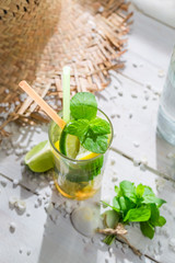 Tasty drink with lemon, lime and sugar
