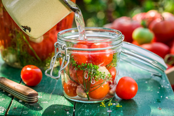 Pickled tomatoes with home grown ingredients
