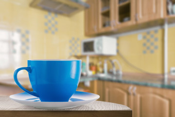 Blue cup on the kitchen table